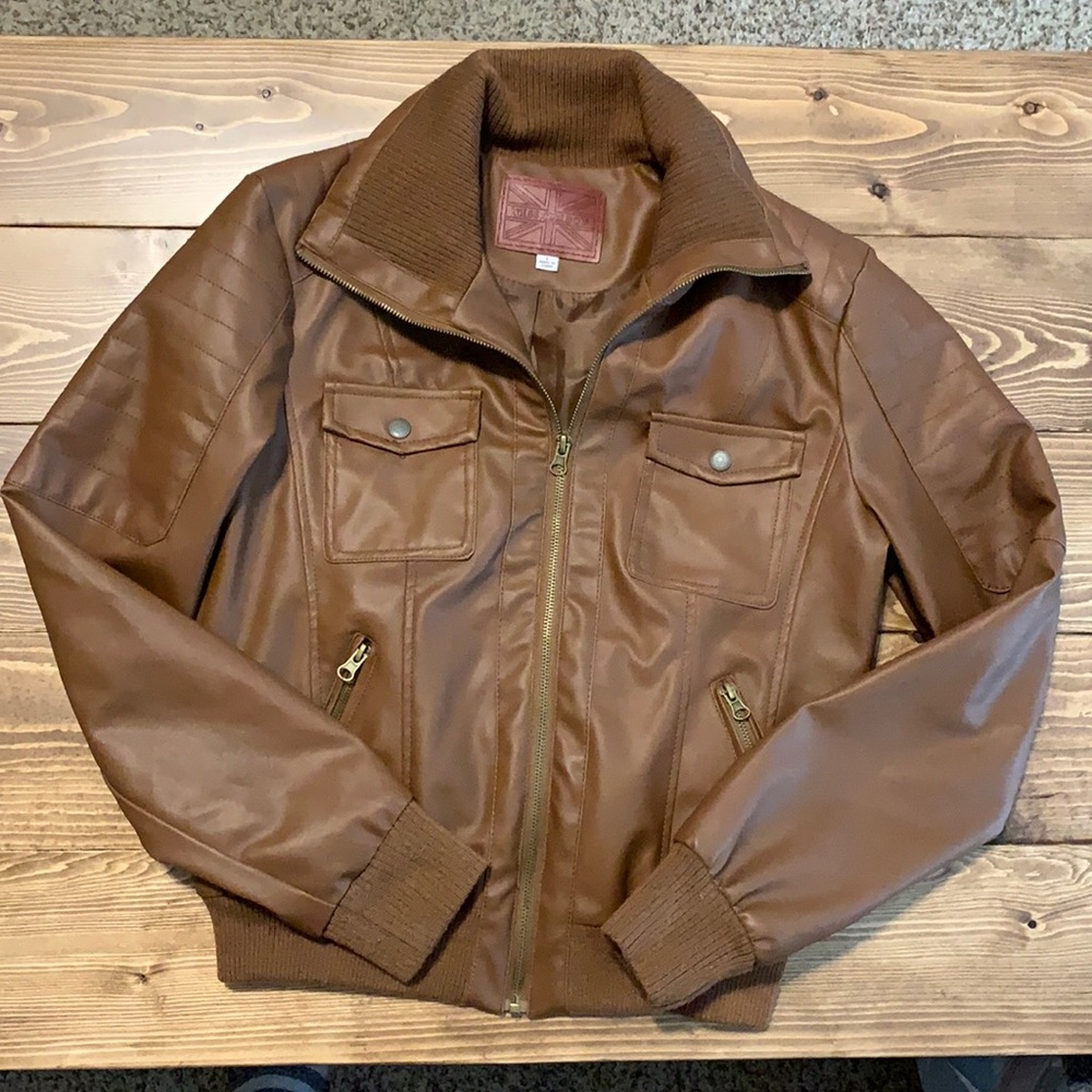 Miss London Brown “Leather” jacket.